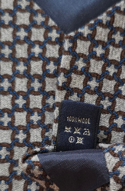 Good Old Days Cravate grise en laine 100% avec motif médaillons marron et bleu, fabriquée en Italie.